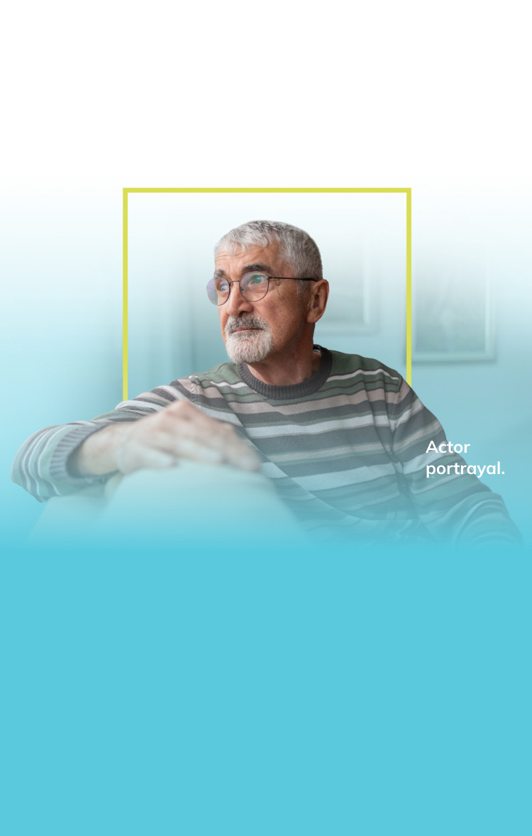 Man sitting on the couch looking to the side
